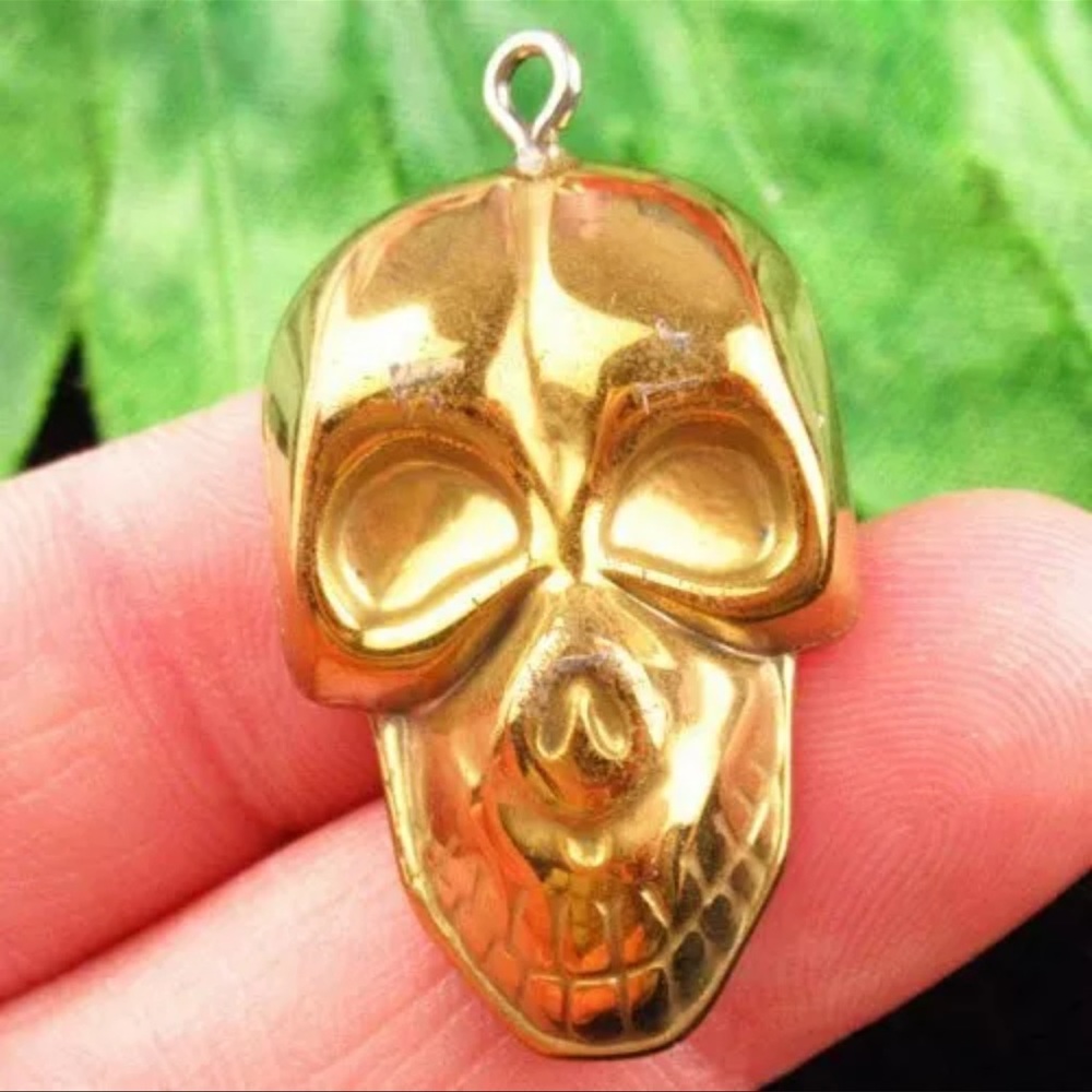 Carved Gold Hematite Skull Necklace